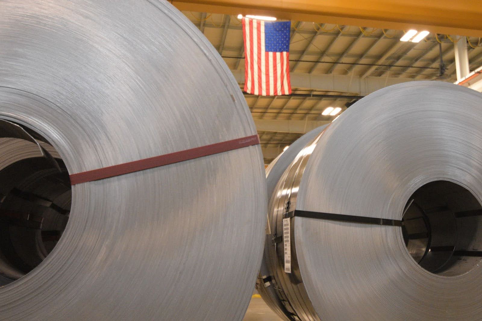 Large steel coils inside ATD’s manufacturing facility, representing ATD’s strategic expansion and continued manufacturing growth.