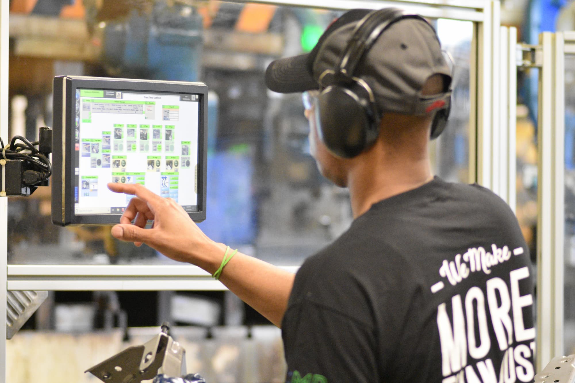 employee reviewing items on monitor