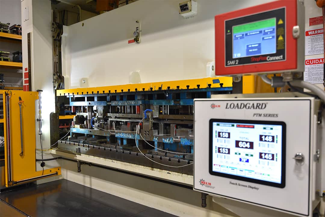 close-up of servo press in action